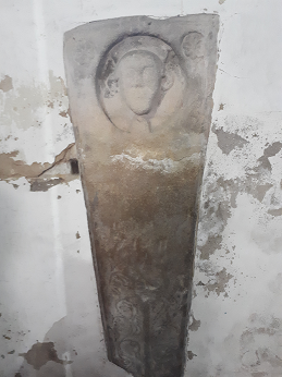 Coffin lid in wall